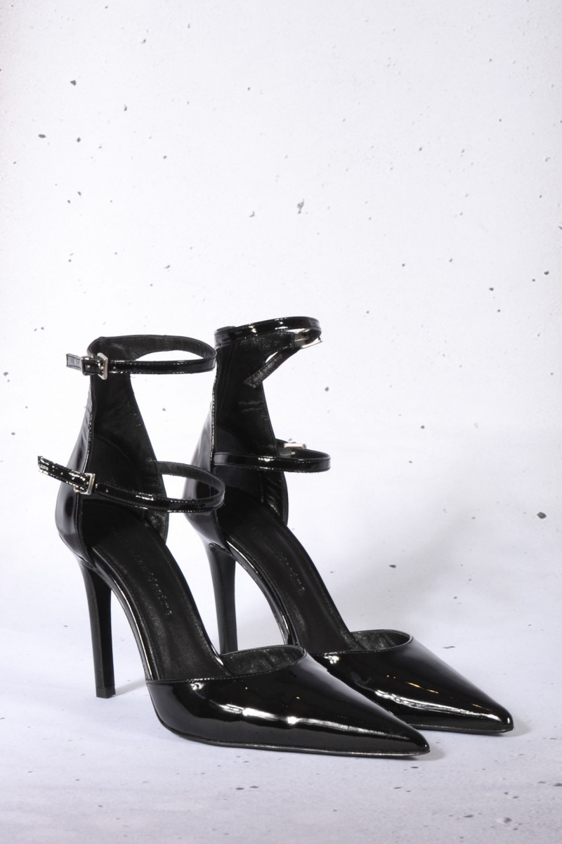 Womans Black Patent Leather Shoes On High Heels Front View Stock